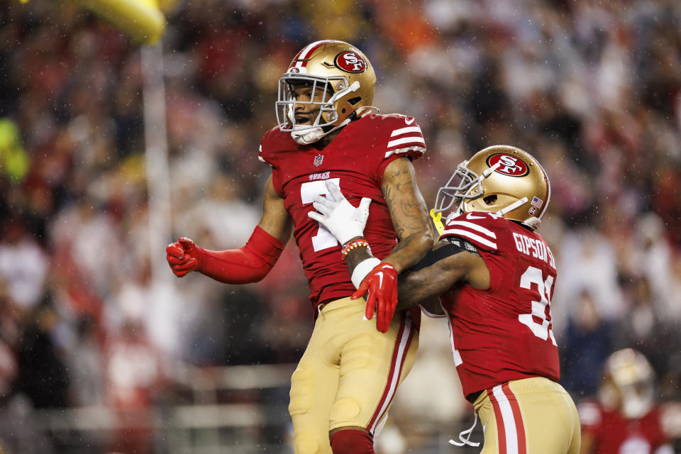 SANTA CLARA, CALIFORNIA - JANUARY 20: Charvarius Ward #7 celebrates with Tashaun Gipson Sr. #31 of the San Francisco 49ers after a play during an NFC divisional round playoff football game against the Green Bay Packers at Levi's Stadium on January 20, 2024 in Santa Clara, California. (Photo by Ryan Kang/Getty Images)