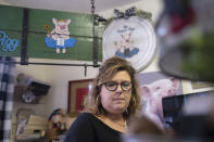 Ginger Pigg in her gift boutique The Perfect Pigg in Cumming, Ga. on Thursday afternoon, Oct. 22, 2021. She says she is struggling to get products to her store in a timely way. (AP Photo/Ben Gray)