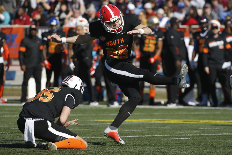 FILE - In this Jan. 25, 2020, file photo, South place kicker Rodrigo Blankenship of Georgia (98) is shown during the first half of the Senior Bowl college football game in Mobile, Ala. The Indianapolis Colts now have two kickers under contract for next season while the NFL's career scoring leader, Adam Vinatieri, remains a free agent. On Wednesday, April 29, 2020, team officials announced they had signed 10 undrafted rookies including Rodrigo Blankenship, one of last season's top college kickers.(AP Photo/Butch Dill, File)