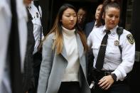 Inyoung You leaves Suffolk Superior Court in Boston, Friday, Nov. 22, 2019, after pleading not guilty to involuntary manslaughter. Prosecutors say You sent Alexander Urtula more than 47,000 text messages in the last two months of their relationship, including many urging him to "go kill yourself." (AP Photo/Michael Dwyer)