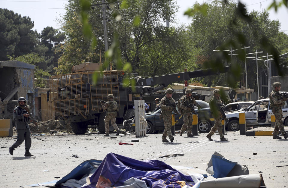 British soldiers arrive at the site of a car bomb explosion in Kabul, Afghanistan, Thursday, Sept. 5, 2019. A car bomb rocked the Afghan capital on Thursday and smoke rose from a part of eastern Kabul near a neighborhood housing the U.S. Embassy, the NATO Resolute Support mission and other diplomatic missions. (AP Photo/Rahmat Gul)