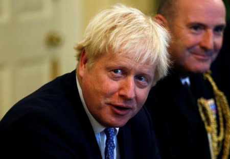 FILE PHOTO: British PM Johnson attends a roundtable at Downing Street in London