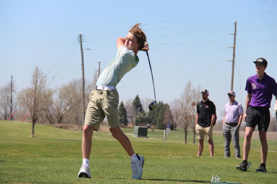 Woodward-Granger's Max Behrens follows his shot during an invitational on Thursday, April 13, 2023, at Woodward Golf Club.