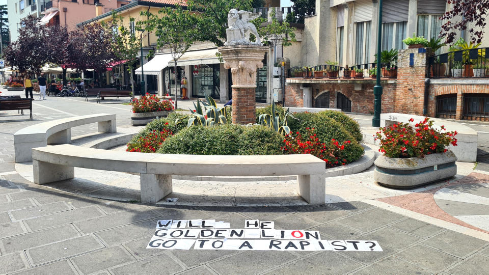 Graffiti is seen on the ground during a protest at the 80th Venice International Film Festival 2023