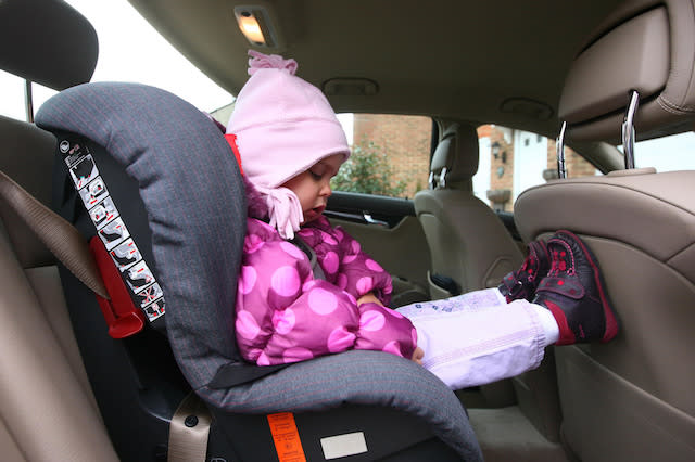 Embargoed to 0001 Monday February 16. EDITORS PLEASE NOTE PICTURE POSED BY MODEL. A young girl prepares for a journey in a child&#39;s car seat near Ashford in Kent, as a survey reveals two in three car seats are not fitted properly. 