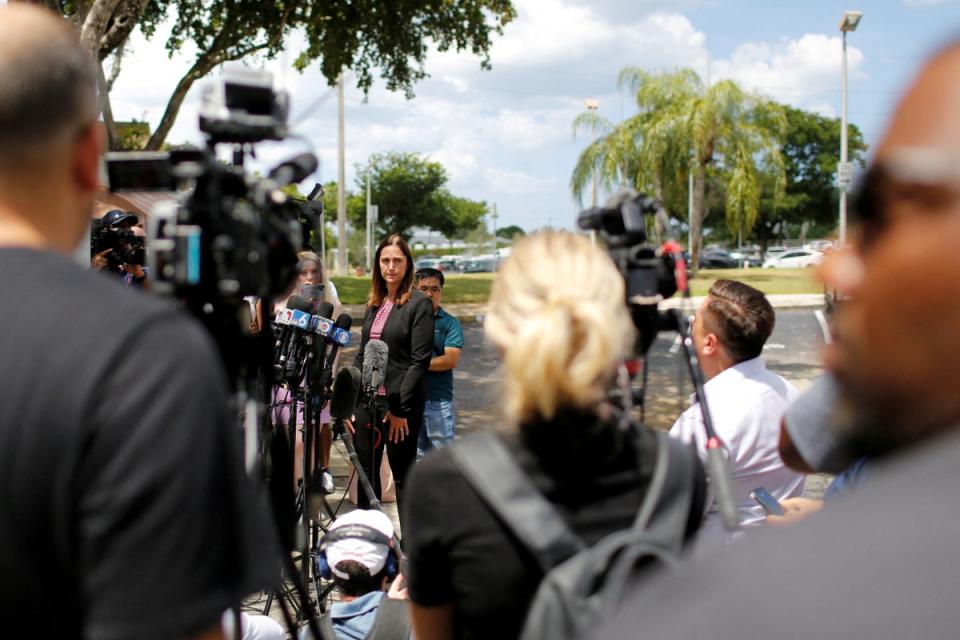 Deanna K. Shullman, Florida attorney representing several media outlets, talks to the media outside the Paul G. Rogers Federal Building and U.S. Courthouse (REUTERS)