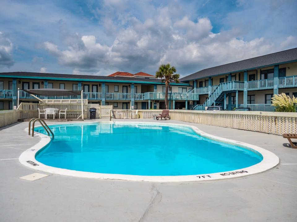 The pool at The Beach House Motel & Suites in Oak Island, N.C