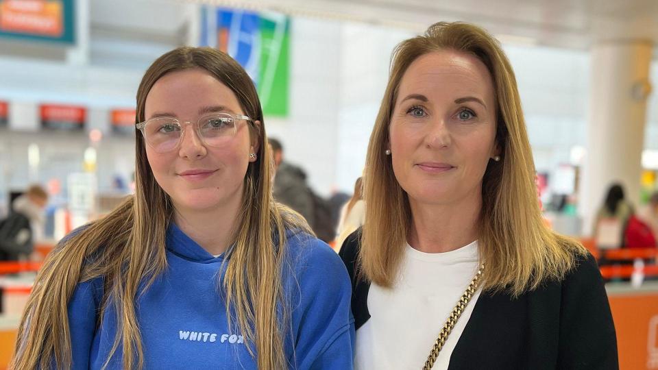 Karry Bicket and her daughter at Glasgow Airport