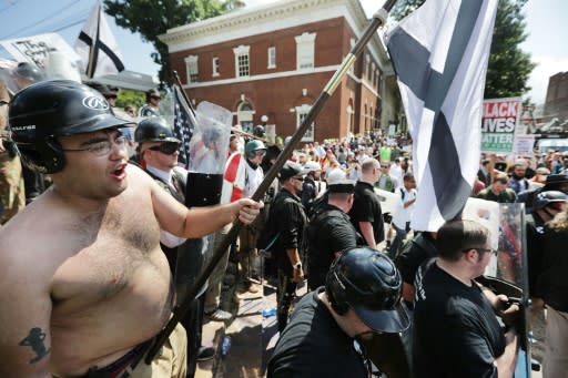 White nationalists, neo-Nazis and members of the 'alt-right' exchange insults with counter-protesters in Charlottesville, Virginia, on August 12, 2017