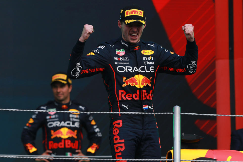 This photo shows Red Bull's Max Verstappen celebrating on the podium after winning the Mexican GP. 