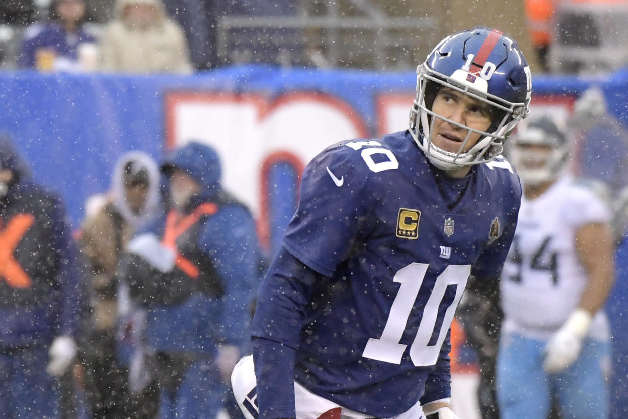 Eli Manning will return as the Giants starting quarterback, coach Pat Shurmur said. (AP)
