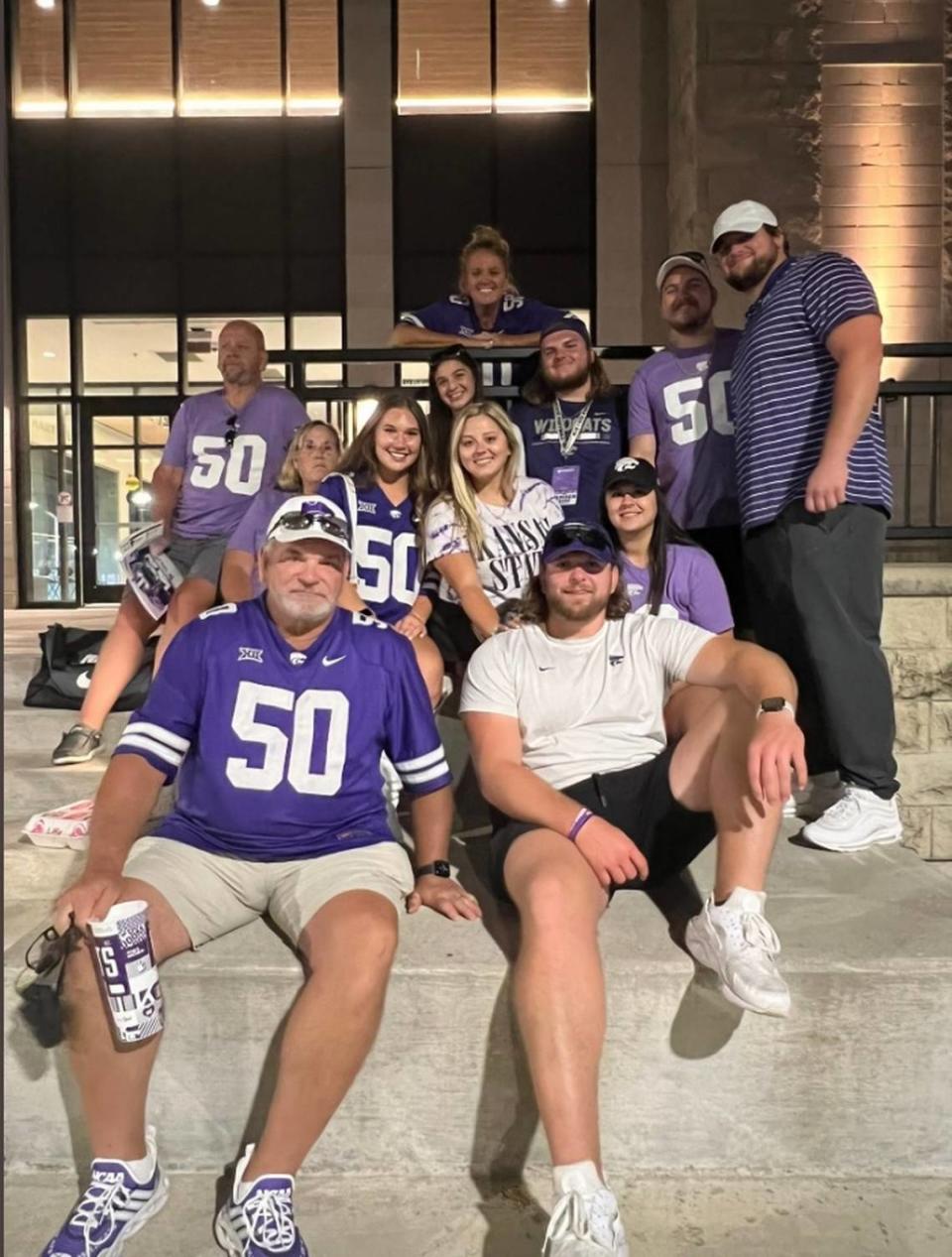 Kansas State offensive lineman Cooper Beebe takes a picture with his family outside Bill Snyder Family Stadium.