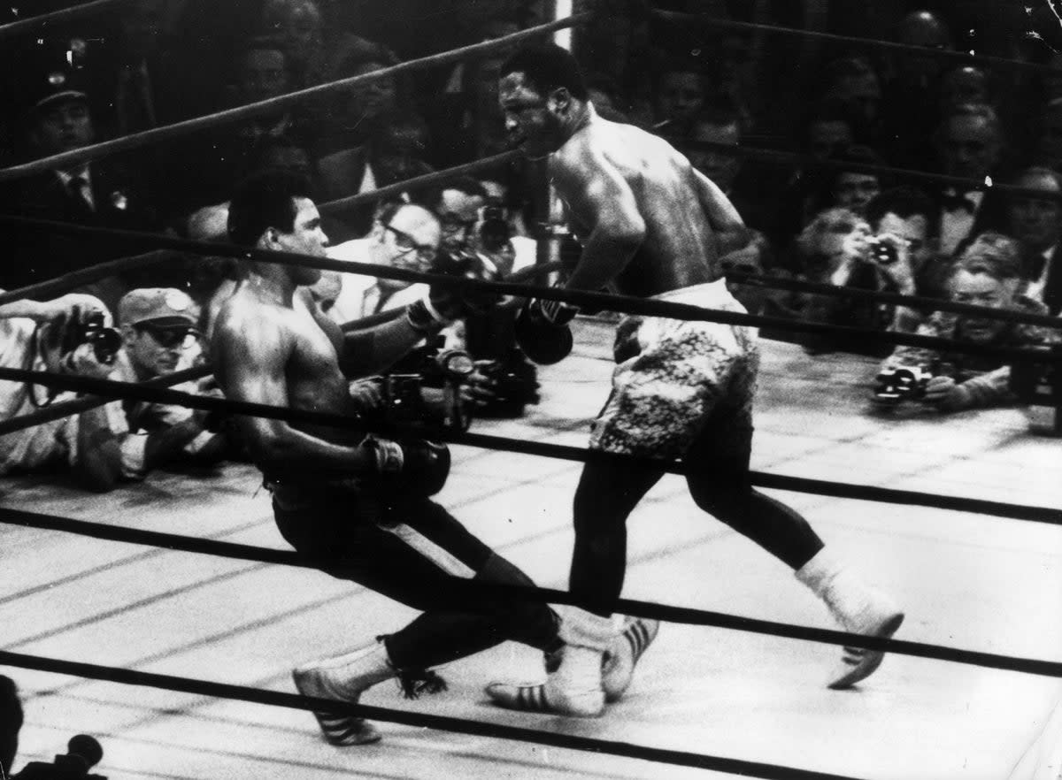 In a title fight at Madison Square Gardens, New York, Muhammad Ali goes down in the 15th round to a left hook from world heavyweight champion Joe Frazier who kept the title with an unanimous points win. (Getty)