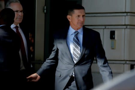 FILE PHOTO: Former U.S. National Security Adviser Michael Flynn departs after a plea hearing at U.S. District Court, in Washington, U.S., December 1, 2017.   REUTERS/Joshua Roberts