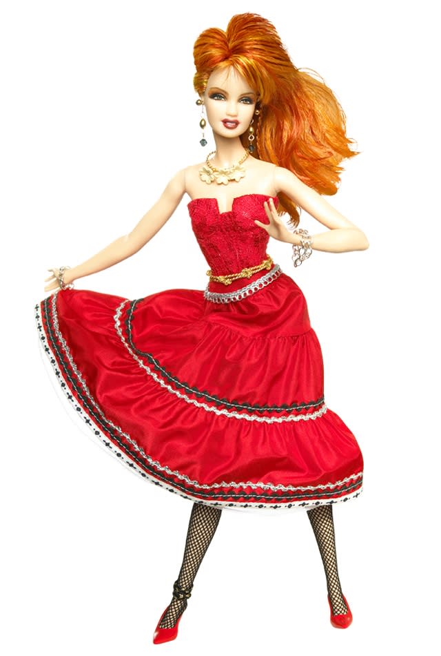 <div class="caption-credit"> Photo by: barbiecollector.com</div><b>Cyndi Lauper doll, released in 2010 for $34.95</b> <br> Her hair is good, her outfit and pose are fantastic, but Cyndi in Barbie proportions is just odd. "Girls Just Want to Have Fun"... and maybe eat a sandwich.