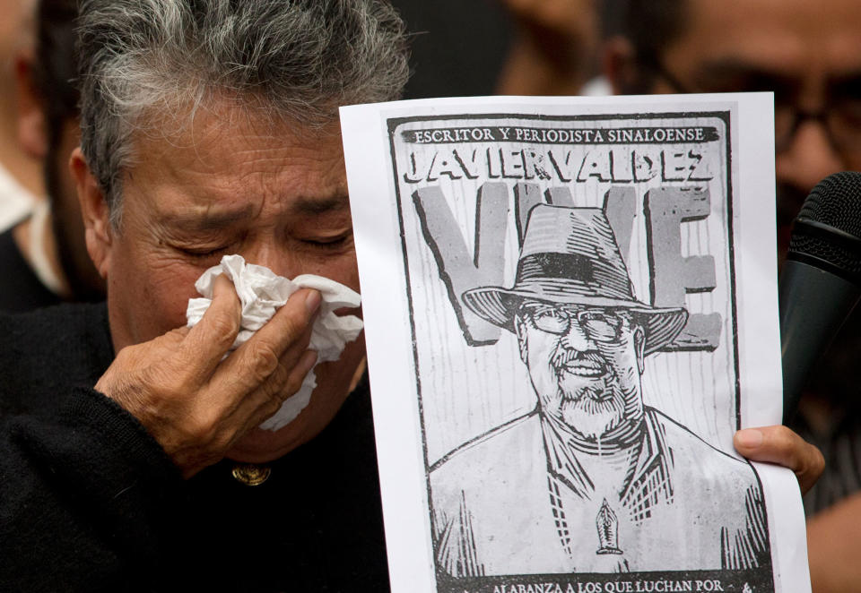 <p>Maria Herrera, a mother who became active in the search for Mexico’s missing after four of her sons disappeared, weeps after speaking about murdered journalist Javier Valdez during a protest against the killing of reporters, in front of the Interior Ministry in Mexico City, Tuesday, May 16, 2017. (AP Photo/Rebecca Blackwell) </p>