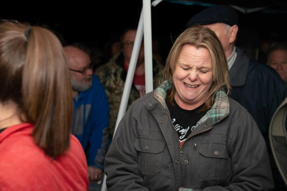 Sue Shelsky grimaces after seeing that her card was not the winner of Waterloo’s Queen of Hearts tournament on Jan. 30, 2024.