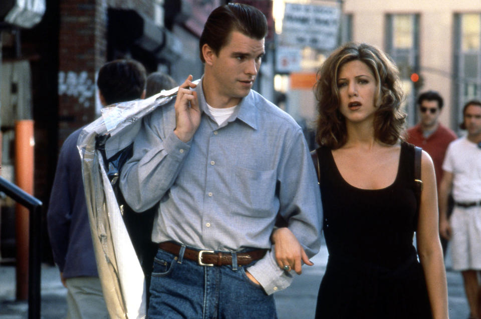 Jen and her husband walking the streets of New York