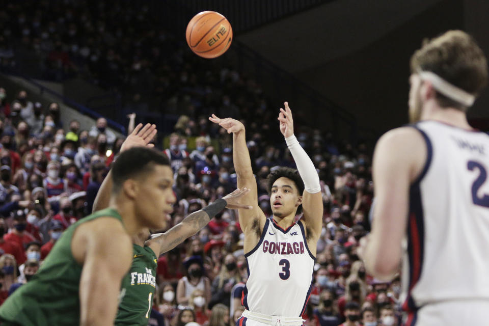 Gonzaga guard Andrew Nembhard (3) shoots during the first half of the team's NCAA college basketball game against San Francisco, Thursday, Jan. 20, 2022, in Spokane, Wash. (AP Photo/Young Kwak)