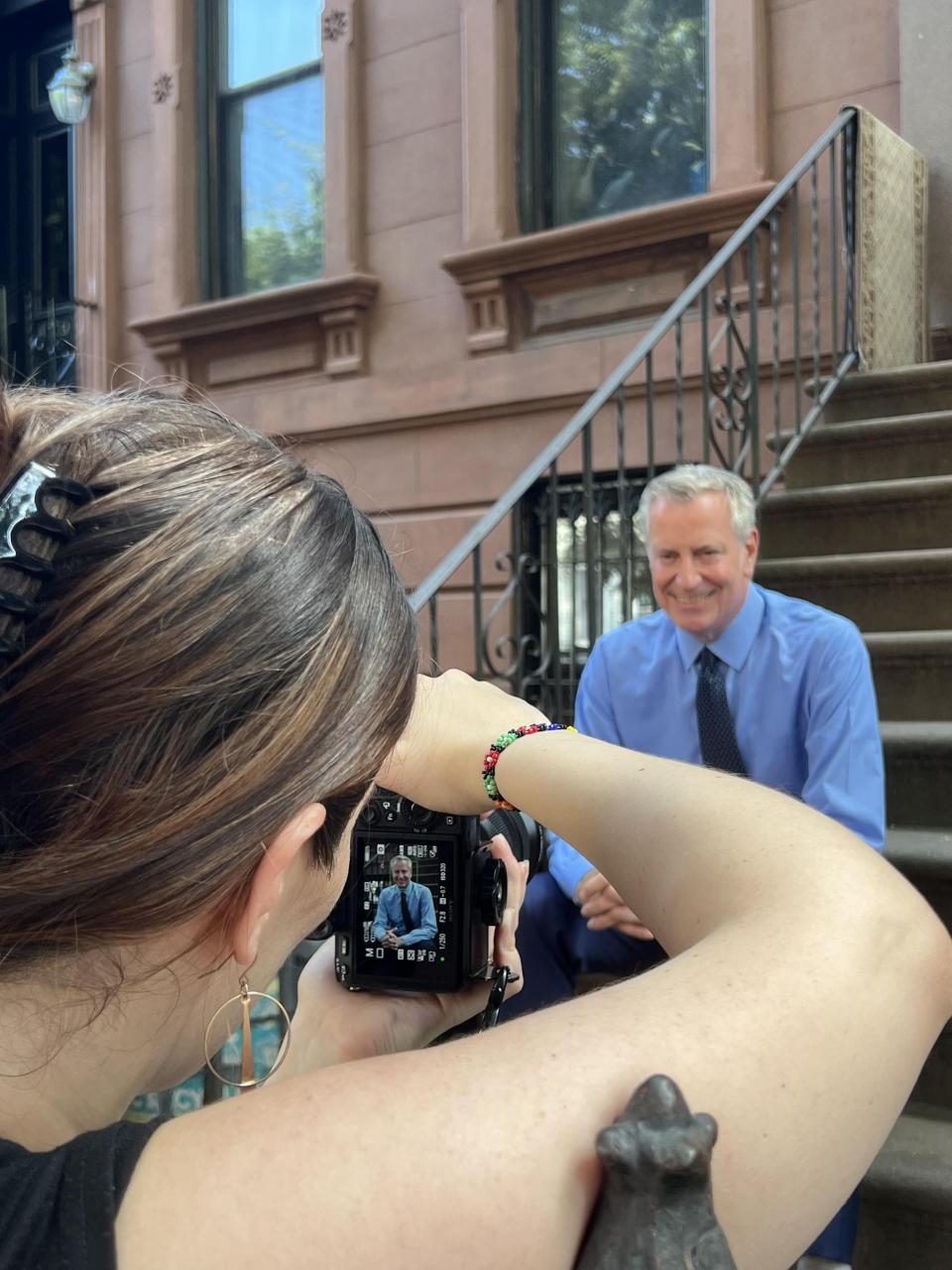 Sam Popp takes a photo of former New York City Mayor Bill de Blasio as part of her freelance work.<span class="copyright">Sam Popp</span>