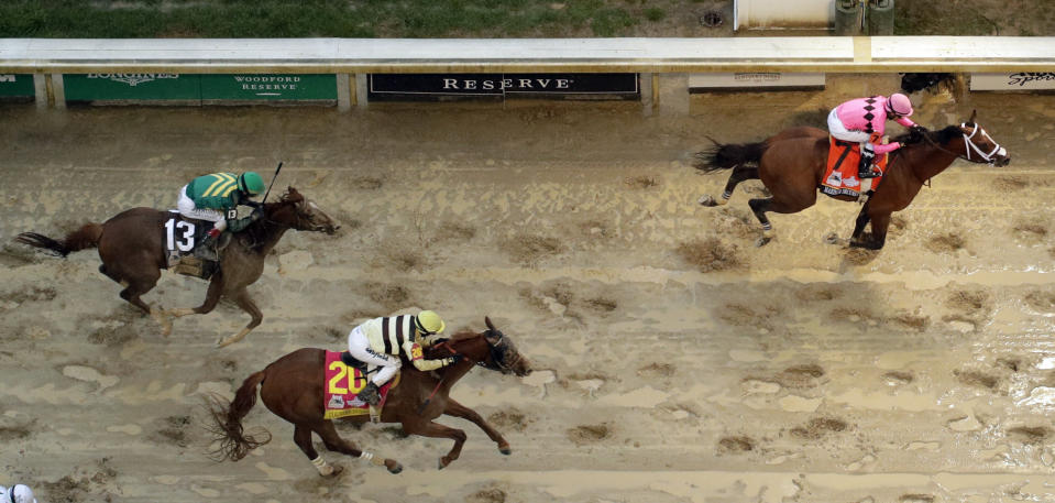 Luis Saez rides Maximum Security across the finish line first followed by Flavien Prat on Country House during the 145th running of the Kentucky Derby horse race at Churchill Downs Saturday, May 4, 2019, in Louisville, Ky. Country House was declared the winner after Maximum Security was disqualified following a review by race stewards. (AP)