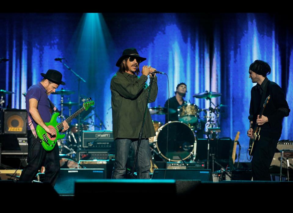 LOS ANGELES, CA:  The Red Hot Chili Peppers perform onstage at the 2010 MusiCares Person Of The Year Tribute To Neil Young at the Los Angeles Convention Center on January 29, 2010 in Los Angeles, California.  (Photo by Larry Busacca/Getty Images for NARAS)