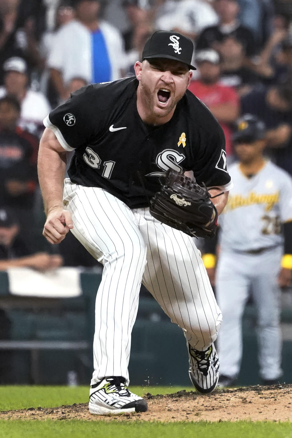 Chicago White Sox relief pitcher Liam Hendriks reacts after striking out Pittsburgh Pirates' Hoy Park for the final out of a baseball game Wednesday, Sept. 1, 2021, in Chicago. The White Sox won 6-3. (AP Photo/Charles Rex Arbogast)