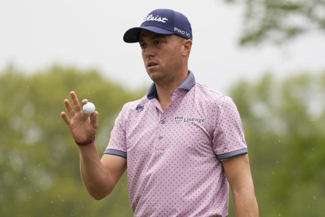 Justin Thomas waves after his putt on the fourth hole during the second round of the PGA Championship golf tournament at Oak Hill Country Club on Friday, May 19, 2023, in Pittsford, N.Y. (AP Photo/Seth Wenig)