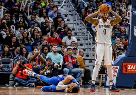 Nov 20, 2017; New Orleans, LA, USA; New Orleans Pelicans center DeMarcus Cousins (0) reacts as he is called for a foul against Oklahoma City Thunder guard Russell Westbrook (0) during the third quarter at the Smoothie King Center. Cousins was ejected from the game after an officials review of the play determined it to be a flagrant two foul. The Pelicans defeated the Thunder 114-107. Derick E. Hingle-USA TODAY Sports