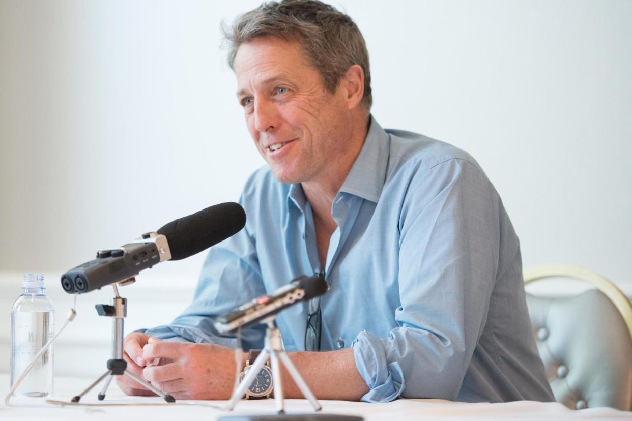 Hugh Grant speaks at a Press Conference For "A Very English Scandal" at The London West Hollywood on 17 October, 2018 in West Hollywood, California: Photo by Morgan Lieberman/Getty Images)