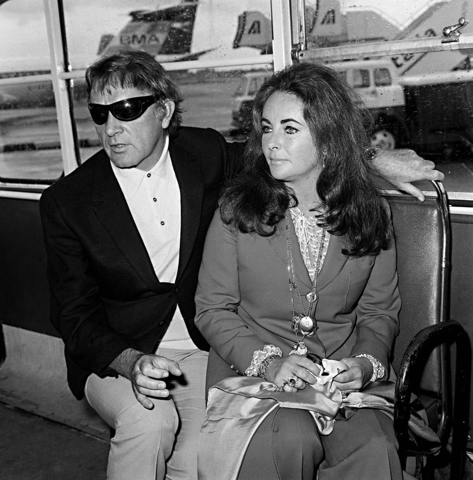 Elizabeth Taylor with Richard Burton at London airport. 10th September 1970.