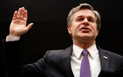 FBI Director Christopher Wray is sworn in - Credit: Reuters