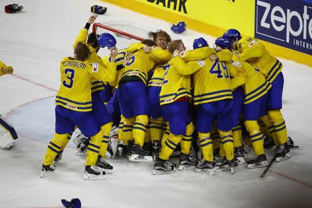 Ice Hockey - 2017 IIHF World Championship - Gold medal game - Sweden v Canada - Cologne, Germany - 21/5/17 - Sweden's Team celebrate after winning the final game REUTERS/Wolfgang Rattay