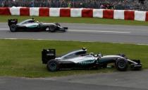 Formula One - Canadian Grand Prix - Montreal, Quebec, Canada - 12/6/16 - Mercedes F1 drivers Nico Rosberg of Germany and Lewis Hamilton of Britain drive. REUTERS/Chris Wattie