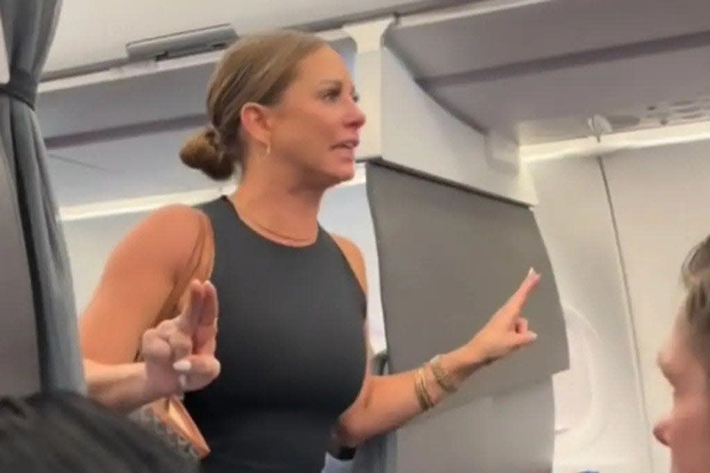 The woman behind the viral airplane meltdown has been identified as a Texas marketing executive and Oklahoma State University graduate.
