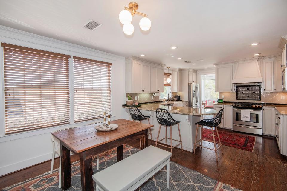 A casual dining space is adjacent to the kitchen.