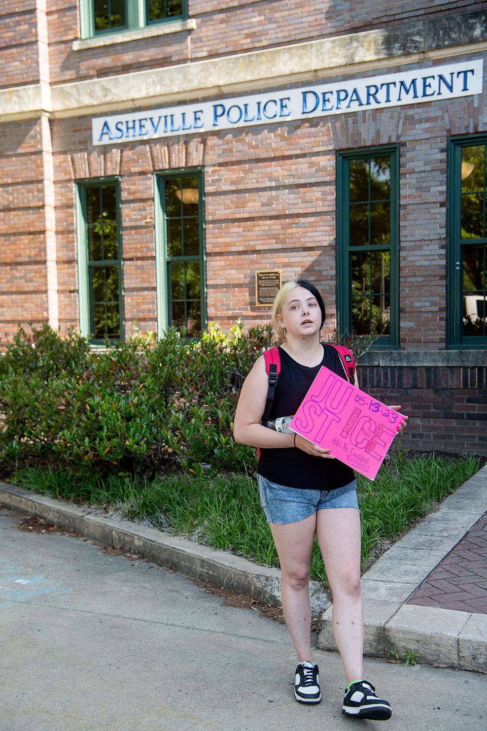 Carrie Speigle, Whitmire's fiancé, stands outside the Asheville Police Department May 17, 2023.