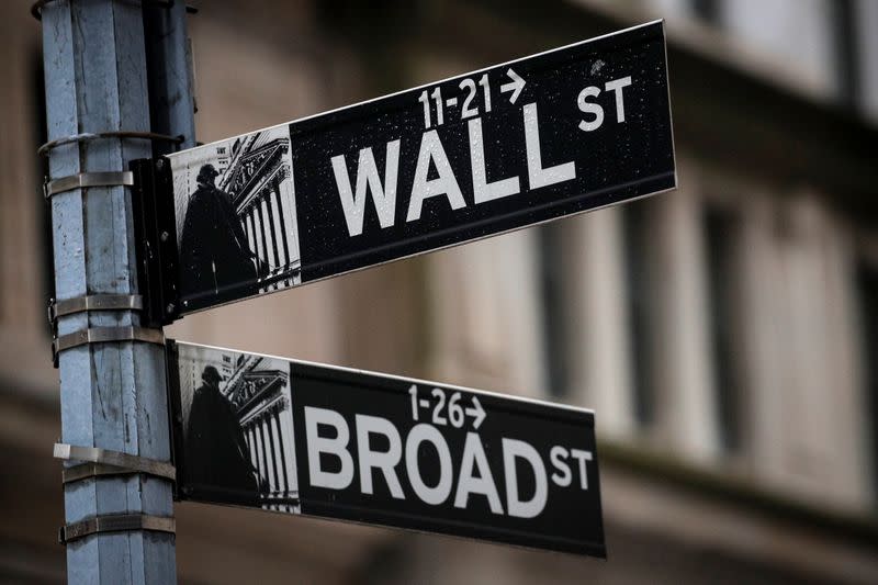 The Wall St. and Broad St. signs are seen outside the NYSE in New York