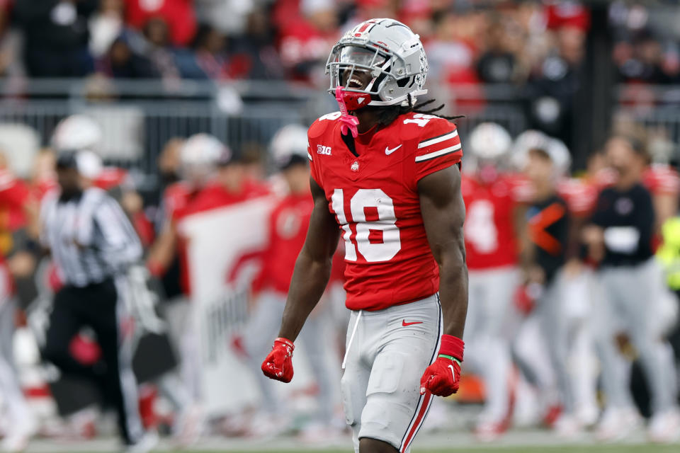 Ohio State receiver Marvin Harrison Jr., a finalist for the Heisman Trophy, said he's unsure if he'll turn pro after this season. (AP Photo/Jay LaPrete, File)