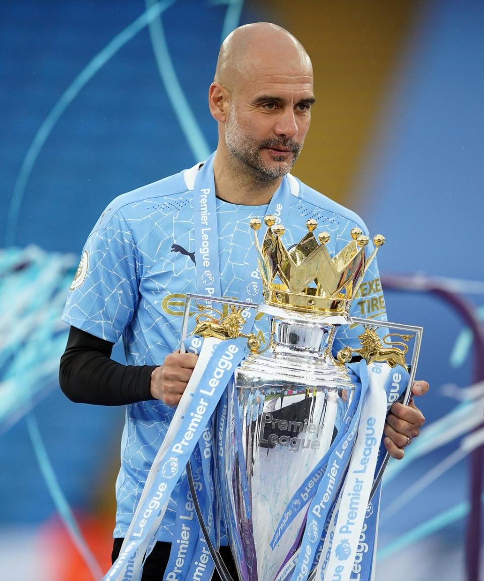 Guardiola is hoping to win the Premier League trophy for a fourth time this year (Dave Thompson/PA) (PA Archive)