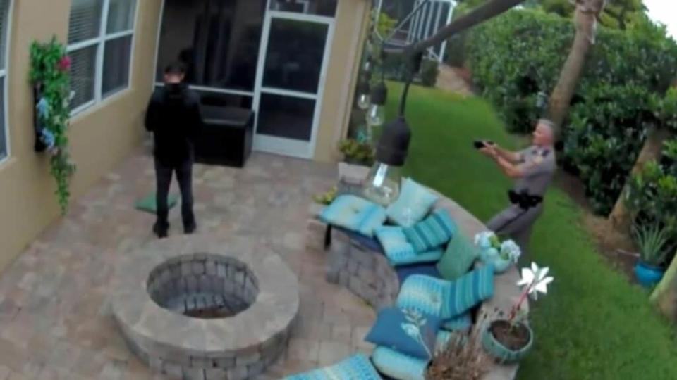 Trooper George Smyrnios (right) is seen on video approaching Jack Roseman (left) with his taser drawn. When the 16-year-old doesn’t comply with the trooper’s orders, he is tased. (CBS 4)
