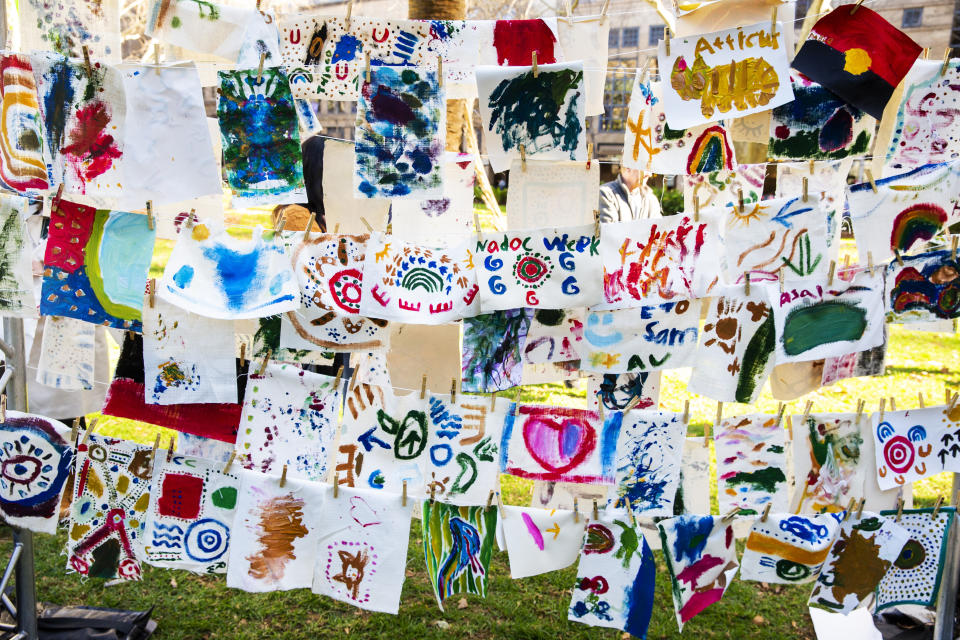 Artworks painted by children on the day are displayed at Hyde Park on July 13, 2019 in Sydney, Australia. NAIDOC Week celebrations are held across Australia each year to celebrate the history, culture and achievements of Aboriginal and Torres Strait Islander peoples. NAIDOC is celebrated not only in Indigenous communities, but by Australians from all walks of life. (Photo by Jenny Evans/Getty Images)