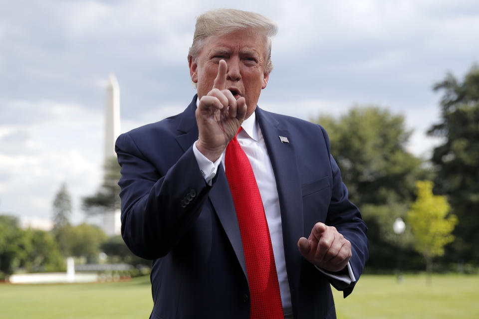 President Donald Trump speaks to members of the media at the White House in Washington, Wednesday, July 24, 2019, as he departs for a short trip to Andrews Air Force Base, Md., and onto Wheeling, W.Va., for a fundraiser. (AP Photo/Carolyn Kaster)