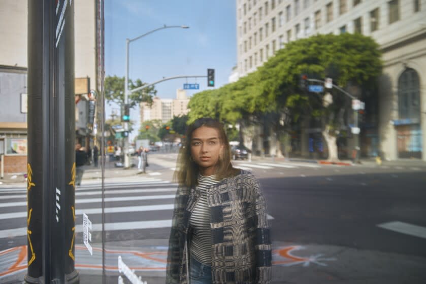 LOS ANGELES, CA - November 9, 2021: Zehra Ahmed, curator of Womxn in Windows, photographed outside the building of the exhibition in Downtown L.A. on 700 S. Main St. Womxn In Windows is a platform for the perspective of womxn (cis, trans and non-binary inclusive) using moving image. Credit: Damon Casarez for The L.A. Times.