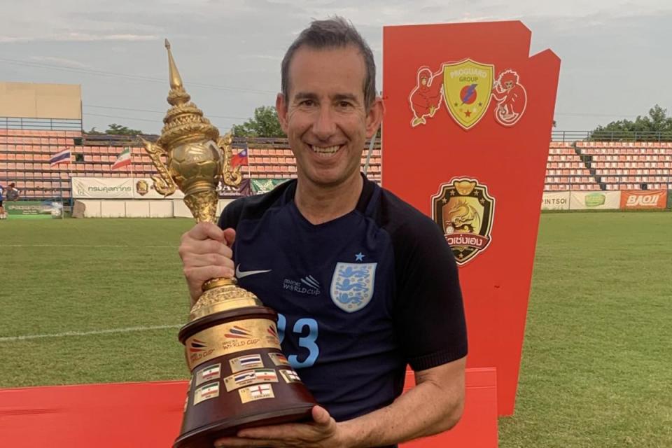 Matthew Wain, a tutor from York College, holds silverware whilst representing England. <i>(Image: Submitted)</i>