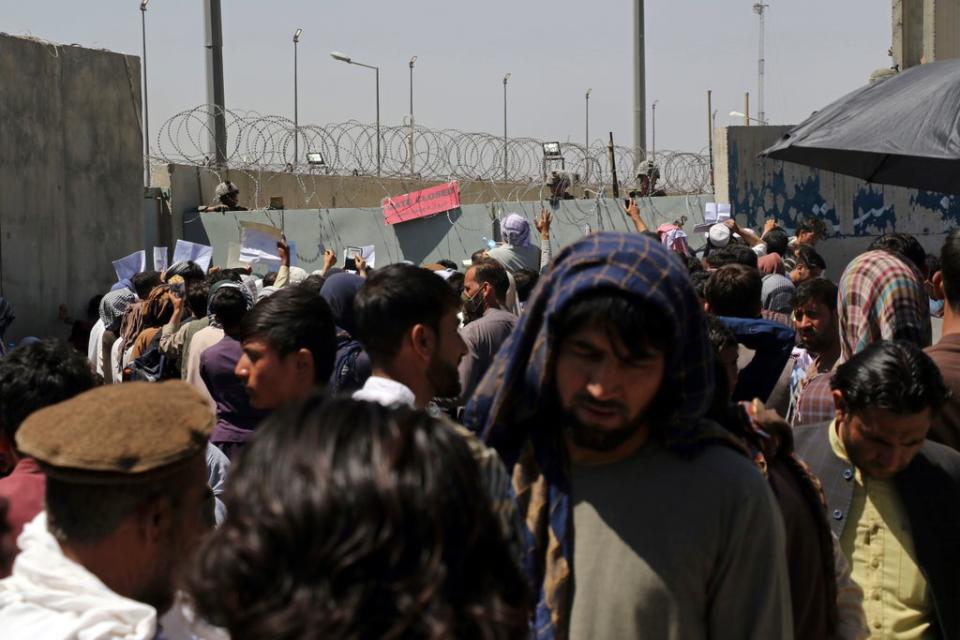 There have been chaotic scenes at Kabul airport as thousands attempt to flee the Taliban (Wali Sabawoon/AP) (AP)