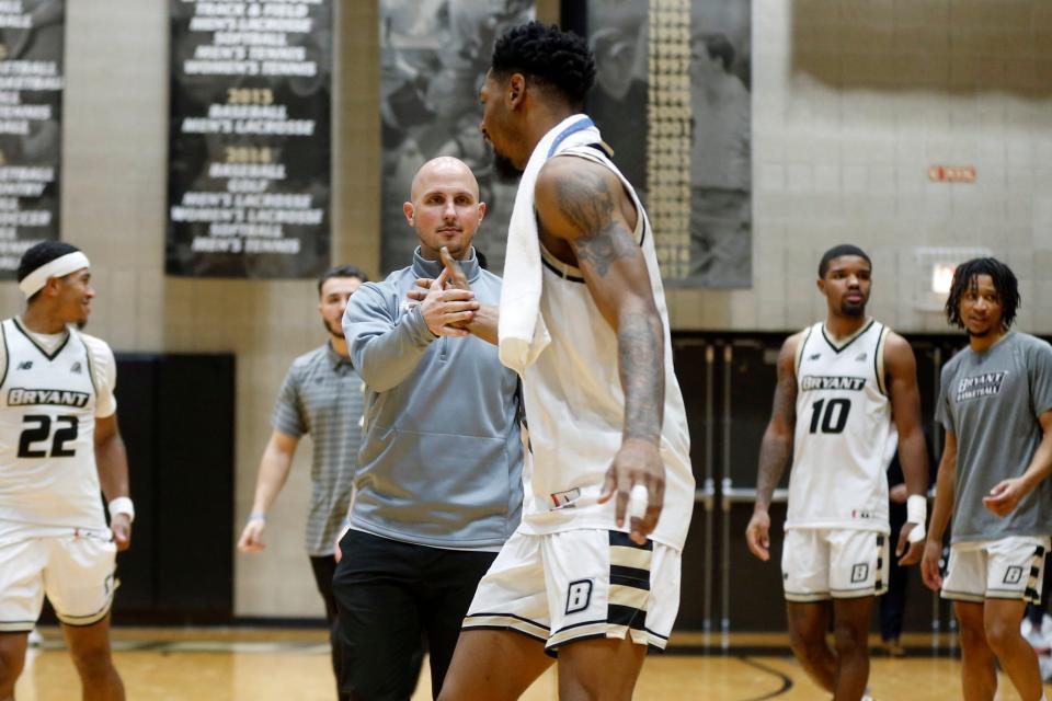 Phil Martelli Jr., shown last season as Bryant men's basketball assistant coach, is now the acting head coach of the Bulldogs, with Jared Grasso on leave.