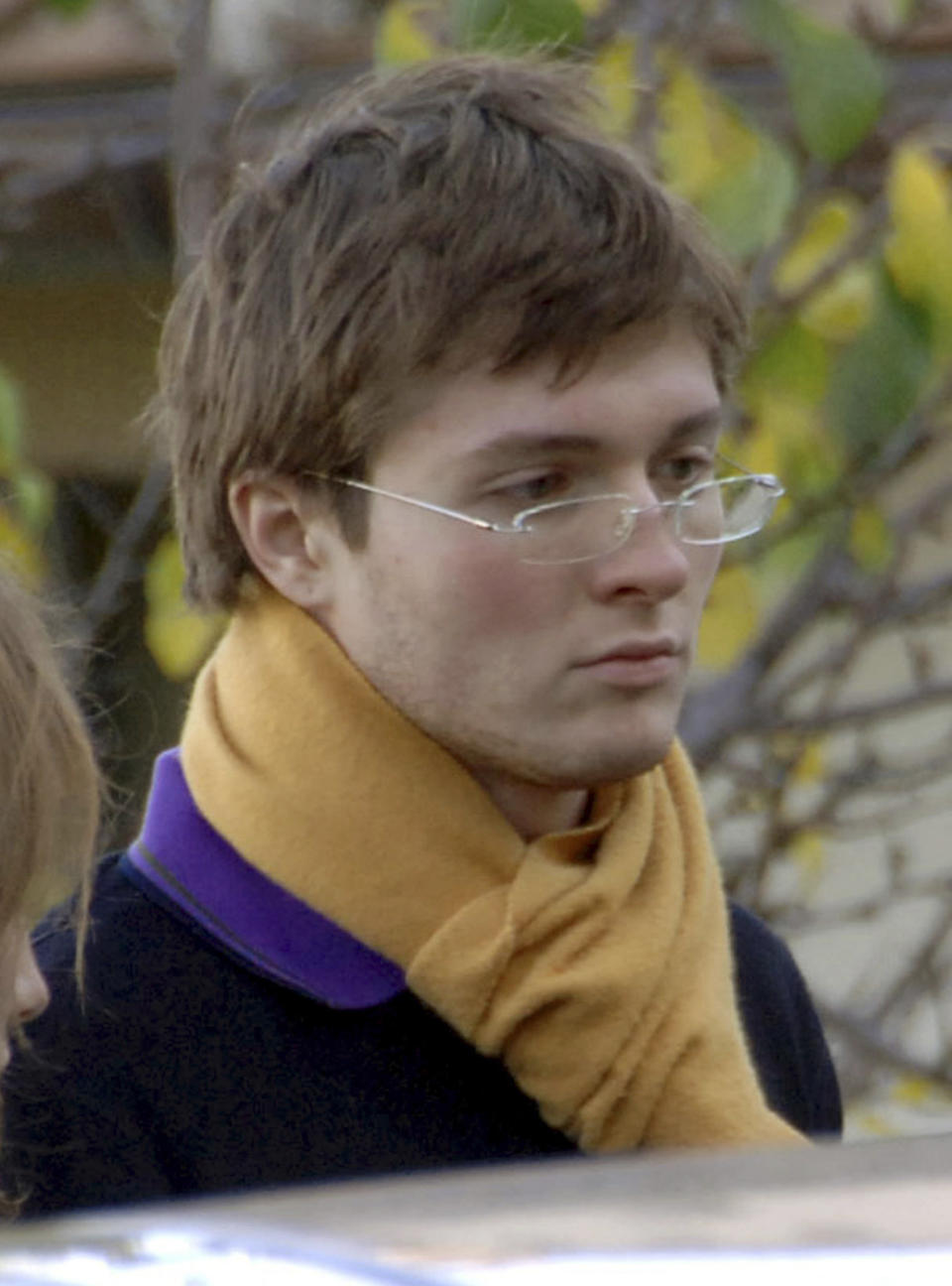 FILE - In this Nov. 2, 2007 file photo, Italian student Raffaele Sollecito, then boyfriend of American student Amanda Knox, stands outside the rented house where 21-year-old British student Meredith Kercher was found dead on Nov 1, in Perugia, Italy. Few international criminal cases have cleaved along national biases as that of American student Amanda Knox, awaiting half world away her third Italian court verdict in the 2007 slaying of her British roommate Kercher. Whatever is decided this week, the protracted legal battle that has grabbed global headlines and polarized trial-watchers in three nations probably won't end in Florence. With the first two trials producing flip-flop guilty-then-innocent verdicts against Knox and her former Italian boyfriend, Raffaele Sollecito, the case has produced harshly clashing versions of events. A Florence appeals panel designated by Italy's supreme court to address errors in the appeals acquittal is set to deliberate Thursday, Jan. 30, 2014, with a verdict expected later in the day. .(AP Photo/Stefano Medici, file)