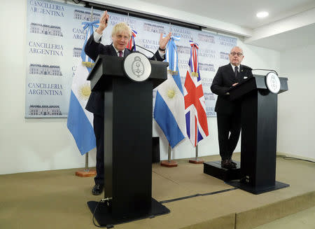 Britain's Foreign Secretary Boris Johnson gestures next to Argentina's Foreign Minister Jorge Faurie during a news conference in Buenos Aires, Argentina, May 22, 2018. REUTERS/Marcos Brindicci