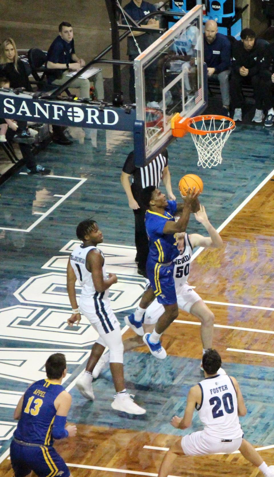 SDSU's Doug Wilson goes up for a shot Monday at the Sanford Pentagon